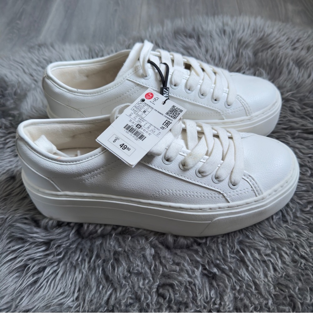 Women’s white Zara sneakers